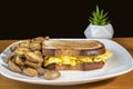 scramble egg cheese melt sandwich with potatoes Royalty Free Stock Photo