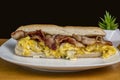 scramble egg amnd maple bacon in a sub roll Royalty Free Stock Photo