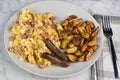 scramble eggs mixed with spam with home fries Royalty Free Stock Photo