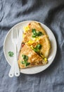 Scramble eggs vegetables ham quesadilla on a grey background, top view. Delicious appetizers, tapas Royalty Free Stock Photo