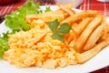 Scrambled egg with french fries