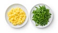 Scrambled eggs with arugula on white plate isolated on white background, top view. Healthy breakfast - fluffy scrambled Royalty Free Stock Photo