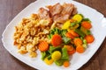 Scrambled eggs with bacon and vegetables mix Royalty Free Stock Photo