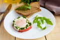 Scrambled eggs, baked in a ring bell pepper, toast, arugula leaves. Royalty Free Stock Photo