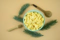 Scrambled eggs in bowl. Yolk and white are stirred and beaten together