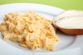 Scrambled eggs and bread with butter Royalty Free Stock Photo