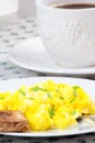 Scrambled eggs, cup of coffee and toast. Royalty Free Stock Photo