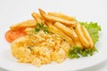 Scrambled eggs and french fries