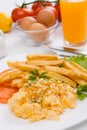 Scrambled eggs and french fries