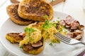 Scrambled eggs with French toast topped with watercress Scrambled eggs with watercress, french toast