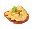 Scrambled eggs on fried bread and