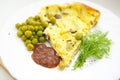 scrambled eggs with green peas and dill Royalty Free Stock Photo