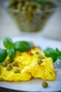 Scrambled eggs with green peas Royalty Free Stock Photo