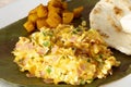 Scrambled eggs with ham and cilantro for Colombian breakfast Royalty Free Stock Photo