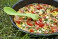 Scrambled eggs omelet with sausages