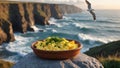 Scrumptious Scrambled Eggs by the Ocean Cliffs at Sunset Royalty Free Stock Photo