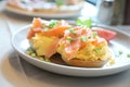 Scrambled eggs with smoked salmon on toast , Breakfast food