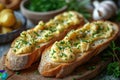 Scrambled Eggs on Toast with Chives and Herbs on Wooden Board