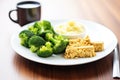 scrambled tofu with quinoa and steamed broccoli