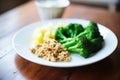 scrambled tofu with quinoa and steamed broccoli