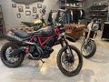 Scrambler icon - Ducati. Customized motorcycle at a dealership. Los Angeles, USA.