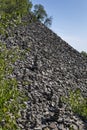 Scrap of basalt poles in hungarian mountain Badacsony