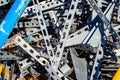 Scrap. Close-up of construction metal waste dump. Pile of pipes and galvanized profile. Background.