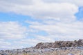 Scrap heap - Scrap Metal ready for recycling with blue sky Royalty Free Stock Photo