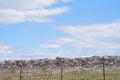 Scrap heap - Scrap Metal ready for recycling with blue sky Royalty Free Stock Photo