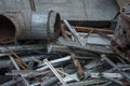 Scrap metal dump, a pile of twisted and unnecessary metal parts, separate garbage collection. Royalty Free Stock Photo