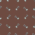 Scrapbook time seamless pattern with blue hoourglass silhouettes. Brown background. Retro artwork