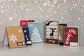 Scrapbooking Christmas cards over festive background Royalty Free Stock Photo