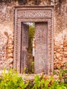 Scraped door in a hidden riun of bi khole in zanzibar