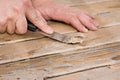 Scraping paint on a deck