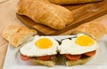 Scrapple and egg hoagie on a rectangular, white plate Royalty Free Stock Photo