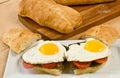 Scrapple and egg hoagie on a rectangular, white plate