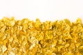 Scraps of gold foil Royalty Free Stock Photo