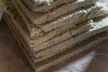 Scraps of green mineral wool piled up. Safe insulation material for the home