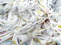 Scraps of paper - waste paper from printing house. Background typography, bookstore. Ends of printed matter after Royalty Free Stock Photo