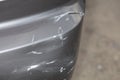 Scratched car bumper, close up Royalty Free Stock Photo