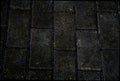 Scratched grey square road tiles texture