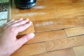 Scratched old parquet flooring needs maintenance. The parquet is damaged by scratches from prolonged use. Master's Royalty Free Stock Photo