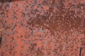 Scratched and rusty orange metal surface Royalty Free Stock Photo