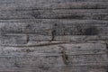 Scratched wooden table top in rustic grey background