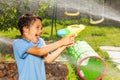 Emotional water gun fight game little boy scream Royalty Free Stock Photo