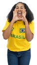 Screaming brazilian female soccer fan Royalty Free Stock Photo
