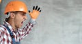 Screaming builder in helmet. Young man construction worker in hard hat crazy and mad shouting and yelling with Royalty Free Stock Photo