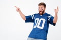 Screaming excited man fan in blue t-shirt standing isolated Royalty Free Stock Photo