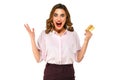 Excited woman with gold credit card in hand on white isolated background Royalty Free Stock Photo