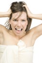 Screaming girl in white towel Royalty Free Stock Photo
